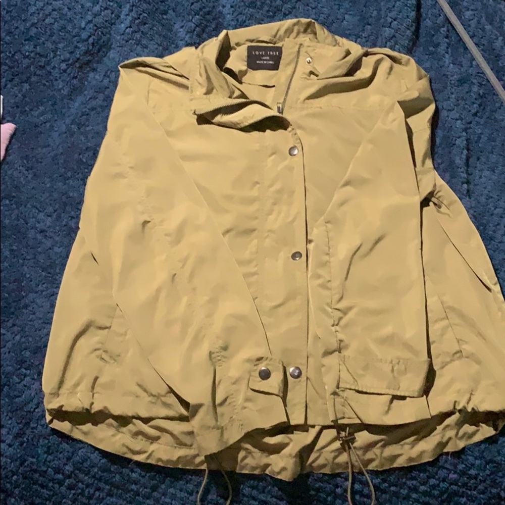 Green zip up wind breaker